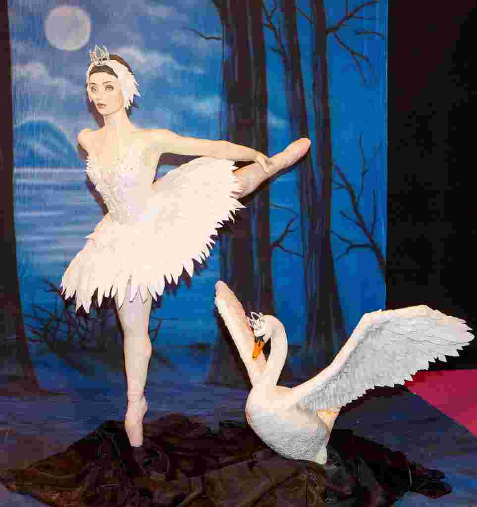 Swan Lake cake on display at the Cake International show at NEC Birmingham.  November 5, 2016.  A self-taught baker has created a stunning life-sized model of Swan Lake - using tens of thousands of RICE KRISPIES.  Talented Emma Morris, 46, spent eight days baking and icing a 2ft-high swan - complete with a 5ft 4in model ballerina.  The delicious designs, which are entirely edible, are made from 80kg (1,76lb) of Rice Krispies, 30kg (66lb) of sugar paste and 30kg (66lb) of modelling paste.  The impressive swan, which has a wing-span of 1m (3ft 2in), and the human-sized ballerina are also embellished with over 500 crystals.  The tasty treats are made of Rice Krispies instead of cake, in order to preserve them - and Emma still has a 4ft Avatar she created two years ago in her living room.  The model of Swan Lake's Odette is one of hundreds of creations at this year's Cake International display Birmingham's NEC.  The show is billed by organisers as the UK's biggest, with up to 30,000 visitors expected.  The mum-of-four, who runs Emma Jayne Cake Design in Aberdare, South Wales, thought of the design after a visit to Ireland when she saw swans gliding across a lake. Other creations on show include Gene Wilder in his most famous role as Willy Wonka, Dolly Parton and Vincent Van Gogh.