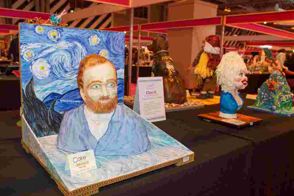 Van Gogh cake on display at Cake International show, NEC Birmingham. November 5, 2016.  A self-taught baker has created a stunning life-sized model of Swan Lake - using tens of thousands of RICE KRISPIES.  Talented Emma Morris, 46, spent eight days baking and icing a 2ft-high swan - complete with a 5ft 4in model ballerina.  The delicious designs, which are entirely edible, are made from 80kg (1,76lb) of Rice Krispies, 30kg (66lb) of sugar paste and 30kg (66lb) of modelling paste.  The impressive swan, which has a wing-span of 1m (3ft 2in), and the human-sized ballerina are also embellished with over 500 crystals.  The tasty treats are made of Rice Krispies instead of cake, in order to preserve them - and Emma still has a 4ft Avatar she created two years ago in her living room.  The model of Swan Lake's Odette is one of hundreds of creations at this year's Cake International display Birmingham's NEC.  The show is billed by organisers as the UK's biggest, with up to 30,000 visitors expected.  The mum-of-four, who runs Emma Jayne Cake Design in Aberdare, South Wales, thought of the design after a visit to Ireland when she saw swans gliding across a lake. Other creations on show include Gene Wilder in his most famous role as Willy Wonka, Dolly Parton and Vincent Van Gogh.